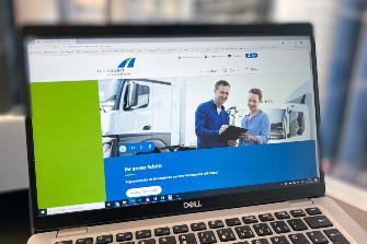 
Ein Laptop-Bildschirm zeigt die Startseite der neuen Toll Collect-Website